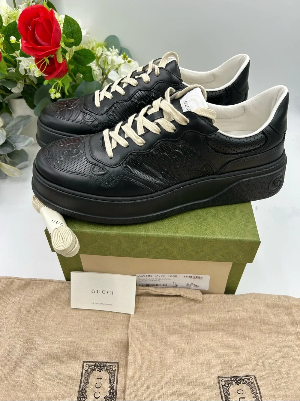 Men's Gucci, GG embossed, black leather sneakers size 11 fits 11.5 made in Italy